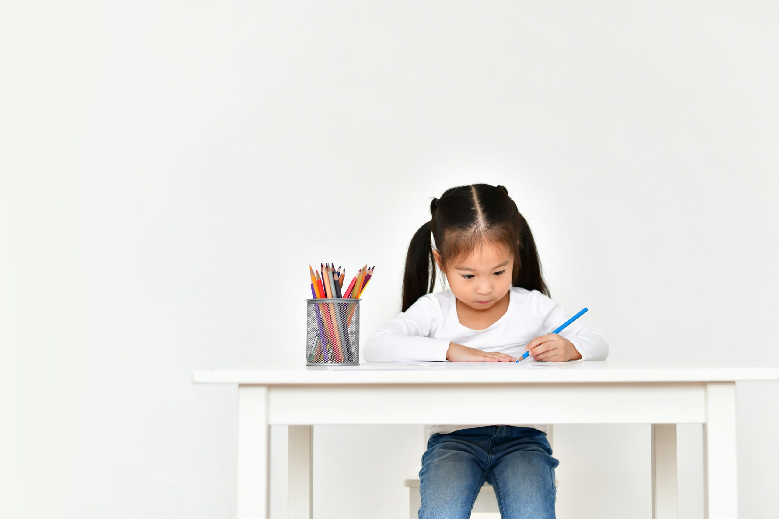 Concept Family. Familys are drawing activities in the home. Family is doing happy activities. Parents are teaching drawing children