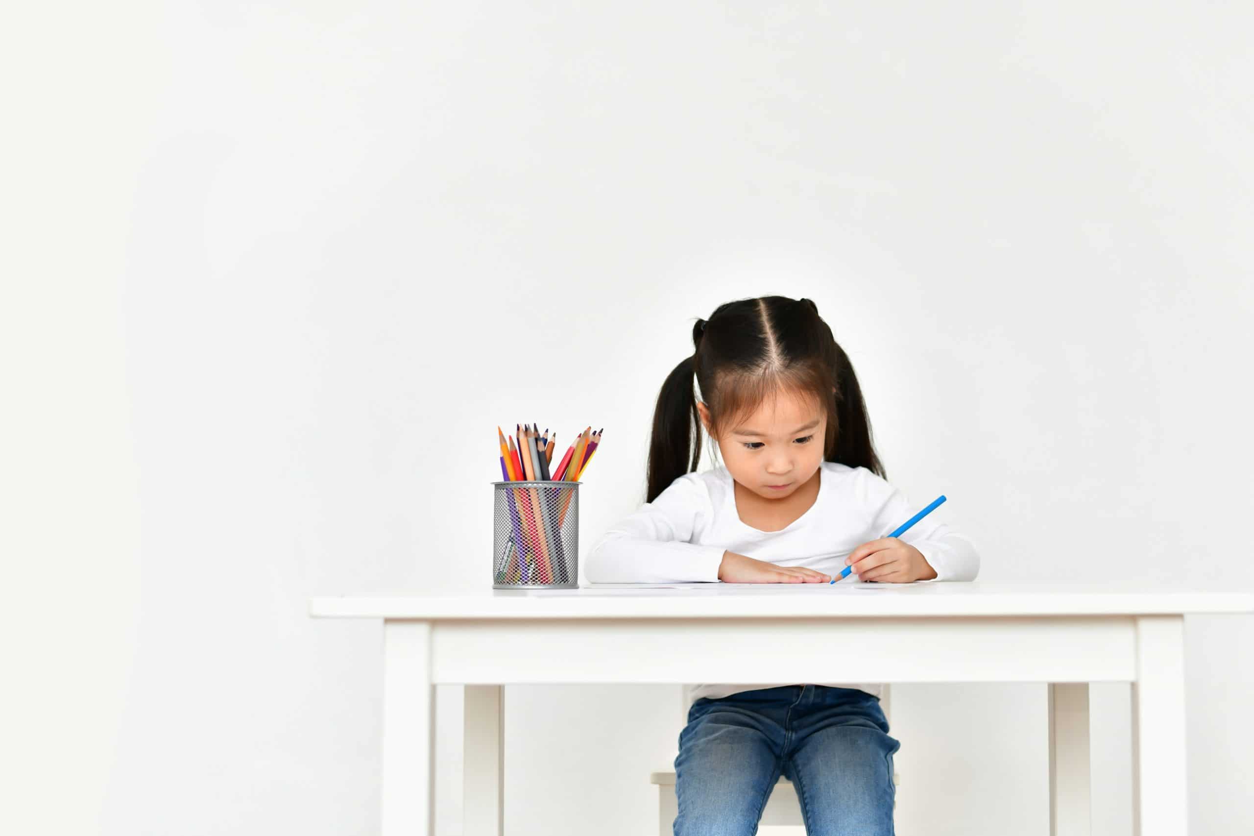 Concept Family. Familys are drawing activities in the home. Family is doing happy activities. Parents are teaching drawing children