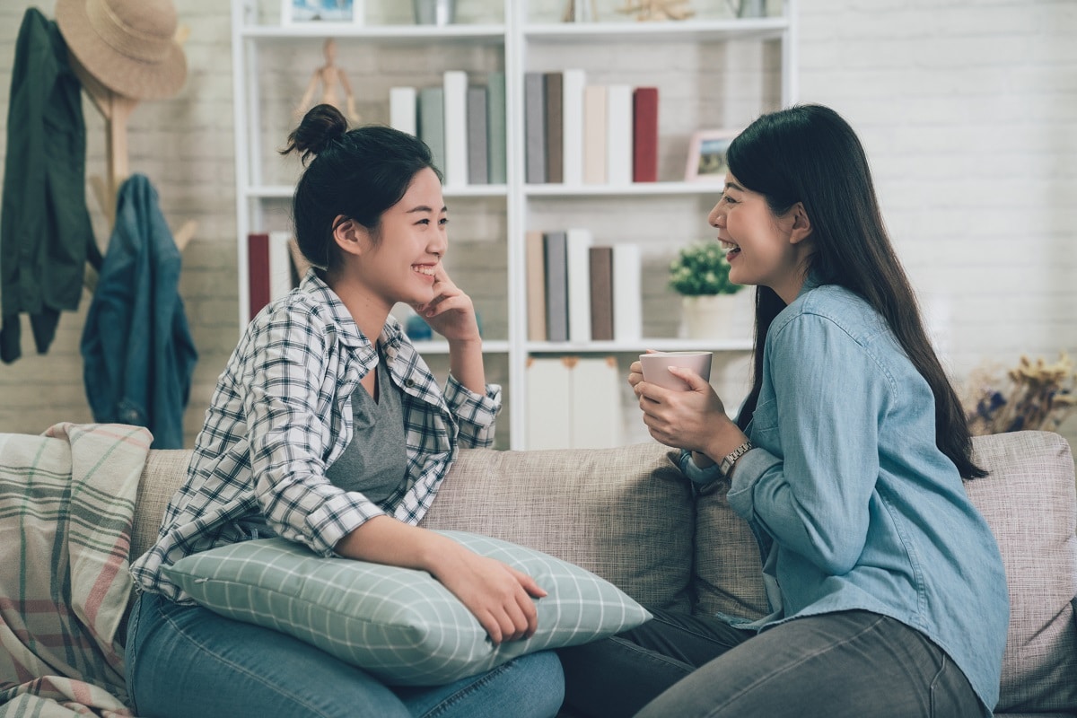 young girls chatting talking about funny things