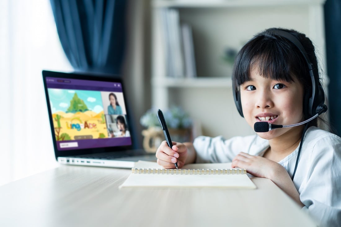 Homeschool Asian little young girl learning online class from sc